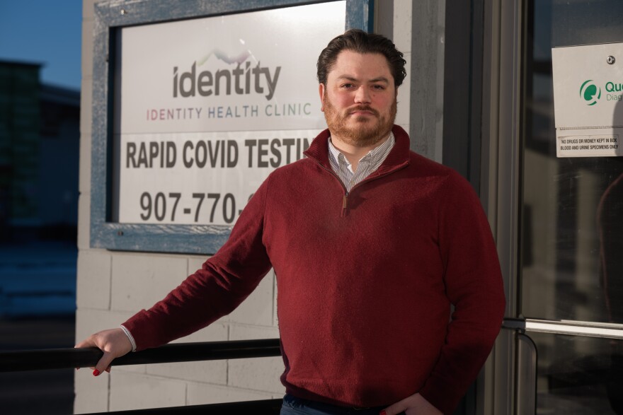 Tom Pittman, Executive Director at Identity, stands outside the walkway of Identity Health Clinic in Anchorage on Thursday, Feb. 13, 2025.